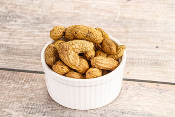 Raw ripe unpeeled peanut heap