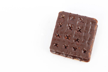 Chocolate coated cracker biscuit isolated on white background
