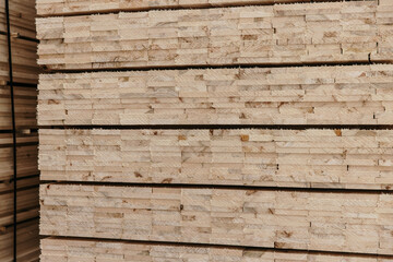 wooden plank bundles outside in winter