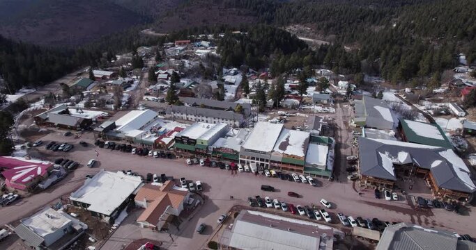 Aerial drone shot of Cloudcroft, New Mexico Main Street, push in, tilt down