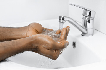 hand washing in bathroom