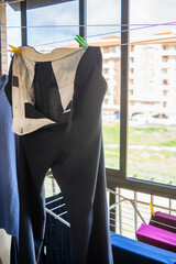 Business Attire Air-Drying Indoors Near Window