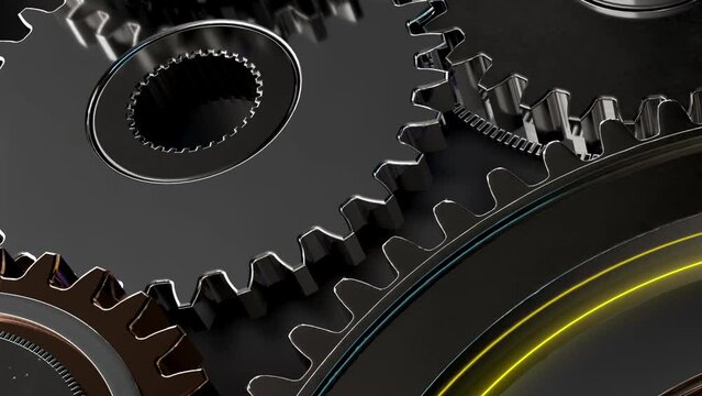 Gears working in the machinery. Cog weel metallic gears in a machine rotating.