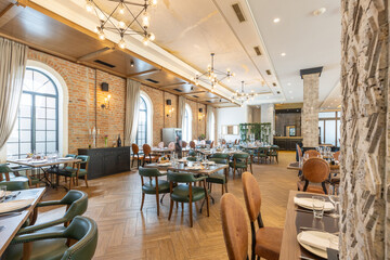 Fototapeta na wymiar Interior of a modern hotel cafe bar restaurant