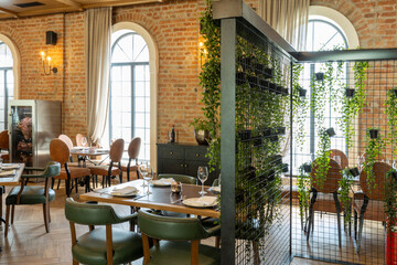 Restaurant interior with plant green wall