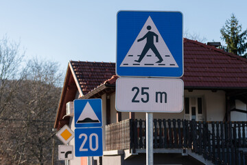 Pedestrian crossing sign with supplementary plate, traffic signs close up