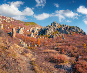 Breathtaking autumn view of Demerdzhi plateau, Crimea, Ukraine, Europe. Picturesque morning scene of Ghost Valley in Crimean Mountains. Beauty of nature concept background.