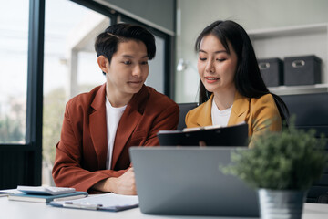 Project manager working and update tasks with milestones progress planning and professional investor working new start up project in the office.