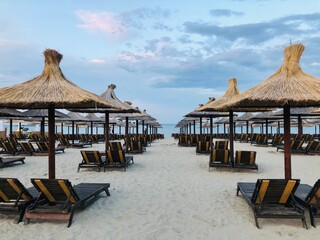 beach chairs and umbrellas