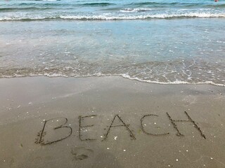 inscription on the beach