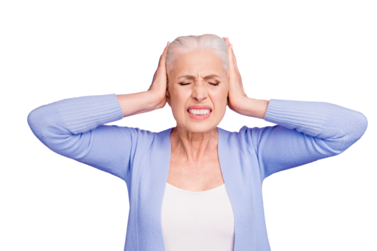 Portrait of grey haired old nice beautiful annoyed woman with palms on head. Isolated over violet purple background