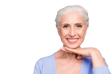 Portrait of gray haired beautiful smiling old lady showing her shining smile with white healthy teeth, copy space, isolated over violet background