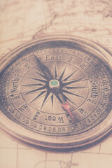 Fototapeta na wymiar antique compass vintage paper background