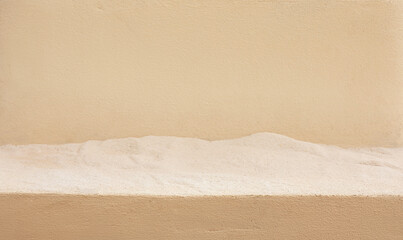 Selective focus.top sandstone product display platform with sand beach background. podium stand and...