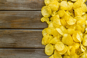 Set of homemade low calorie crispy potato chips in bowl, top view