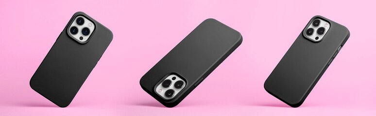 set of three iPhone 15 and 14 Pro max in black silicone case falling down in different angles, back...