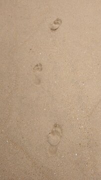Huellas en la playa