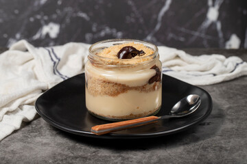 Chocolate magnolia dessert. Magnolia dessert with chocolate filling on a dark background