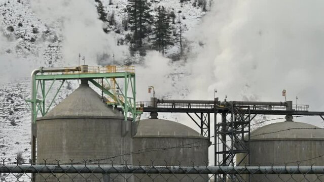 Smoky Signals from Snow-Clad Industrial Silos