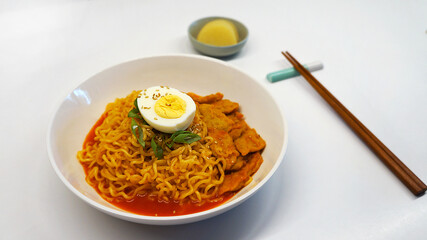 Korean instant noodles with fish cake and boiled egg - Rabokki korean food