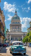 Fototapeta na wymiar Havana's Historical Landmark: The Iconic El Capitolio Building Against a Bright Blue Sky, Complemented by a Classic Vintage Car in the Foreground