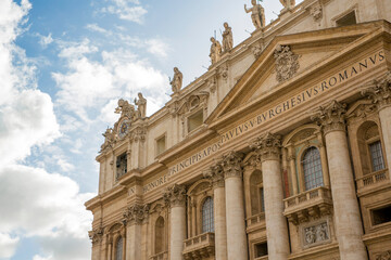 Facade of Papal Basilica of Saint Peter in the Vatican located in Rome, Italy. It's the most...