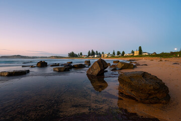 Morning view of rocky coastline of Mona Vale Beach, Sydney, Australia.