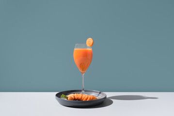 Elegant cocktail and salmon slices on modern backdrop