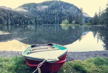 Foto op Plexiglas Boat on the lake © Galyna Andrushko