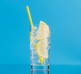 Lemonade with ice in glass