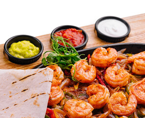 Shrimp fajitas with bell pepper and onion
