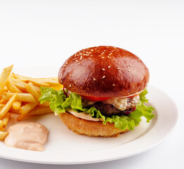 Classic beef burger with cheese and french fries