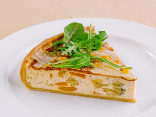 Quiche Lorraine on White Plates