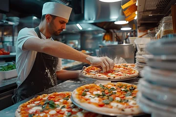 Foto auf Acrylglas Pizza chef finishing the preparing of in professional pizzeria restaurant kitchen. © jakapong