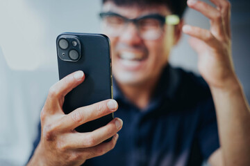 sad depression serious people from work,study stress problem.asian man feeling tired suffering using cell phone working work place.concept global economic,health problems