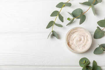 Natural scrub with eucalyptus extract on a textured background. Body Scrub. Body care. Sugar...