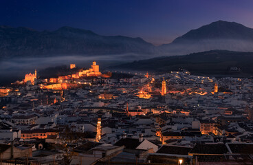 Panorama of the city of Antequera ona misty twilight