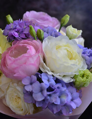 spring flower bouquet; rose, eustoma, hydrangea, lavender in pink, purple and white colors