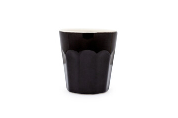 Dosing cup made of black porcelain.