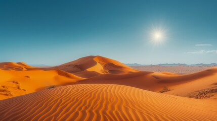 Fototapeta na wymiar Majestic Sun over Tranquil Sahara Desert Dunes at Sunrise with Clear Blue Sky