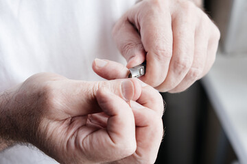 Man doing a manicure at home. Close-up.