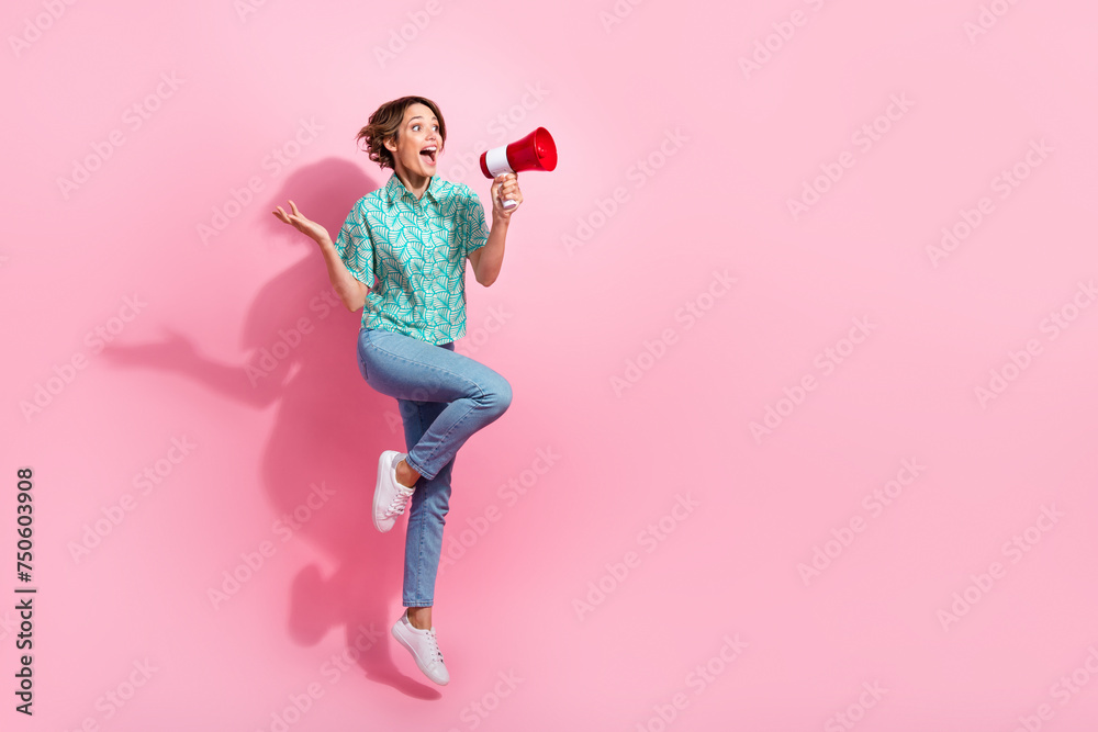 Poster full length profile portrait of astonished person jump communicate loudspeaker empty space isolated 