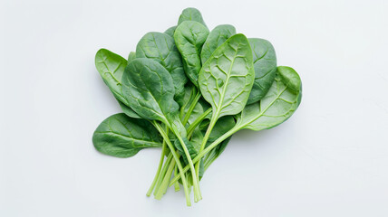 Fresh spinach leaves on a clean white background, symbolizing healthy eating.