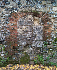 Filled in arch in old stone wall in Winchester.