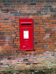 Post box in Brick wall