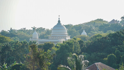 mosque with a view of blue clouds during the day