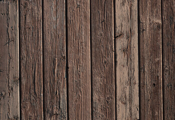 Texture of old brown wooden plank fence