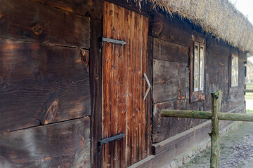 Traditional wooden house of the polish village. the old house is made of wood and hay