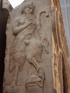 Ancient carving of a Greek Satyrs