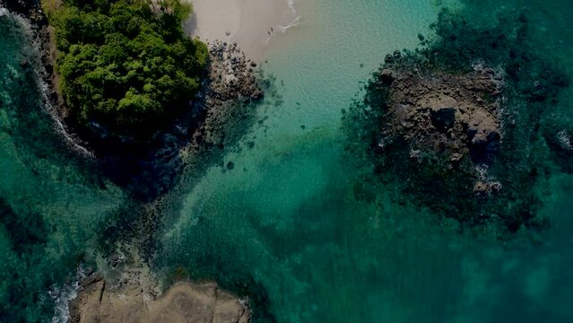 Birds eye view flying over beach island, Coiba National Park, panama, central America - stock video